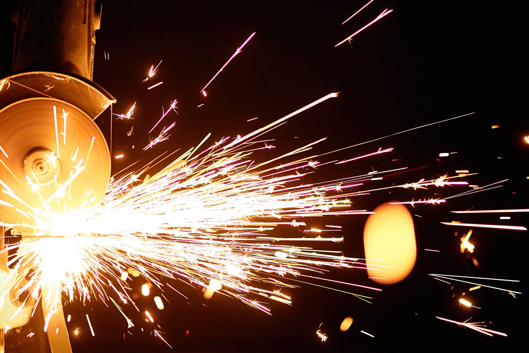 CNC machining sparks in heavy-duty manufacturing